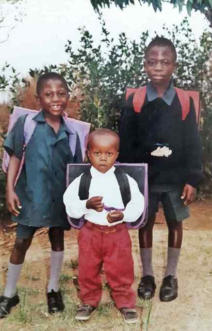 Victor Mwandila with his elder brother Bright and younger brother Sangwani during childhood in Mkushi, Zambia